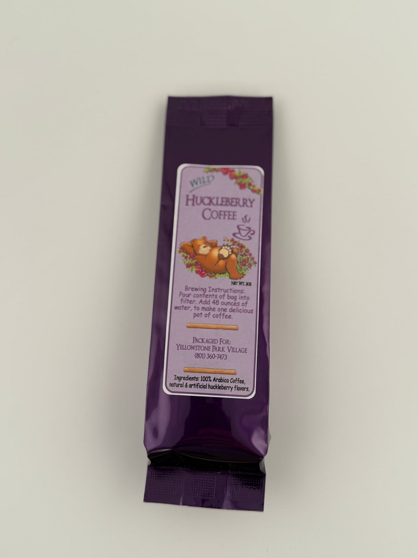 Bag of huckleberry-infused ground coffee