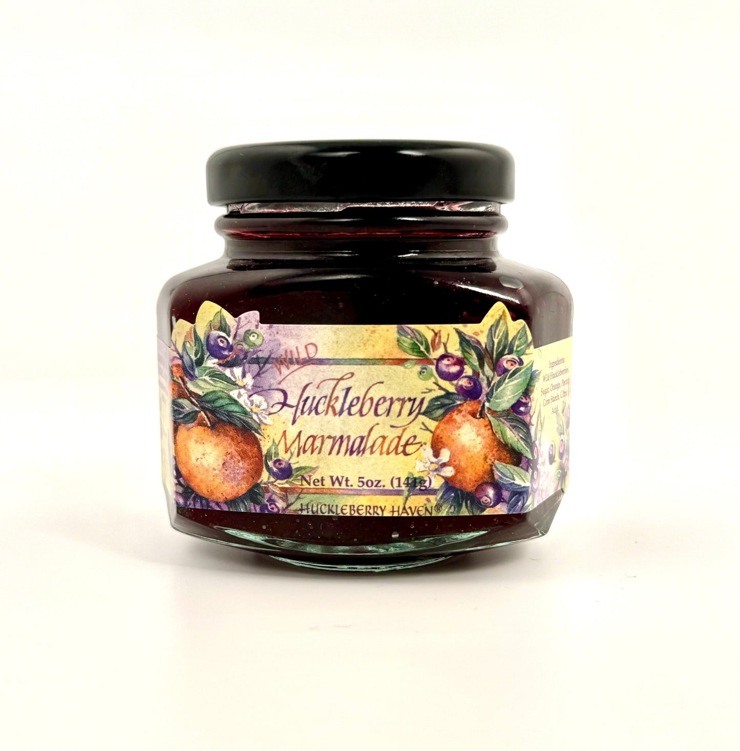 Jar of huckleberry marmalade with citrus and berry blend