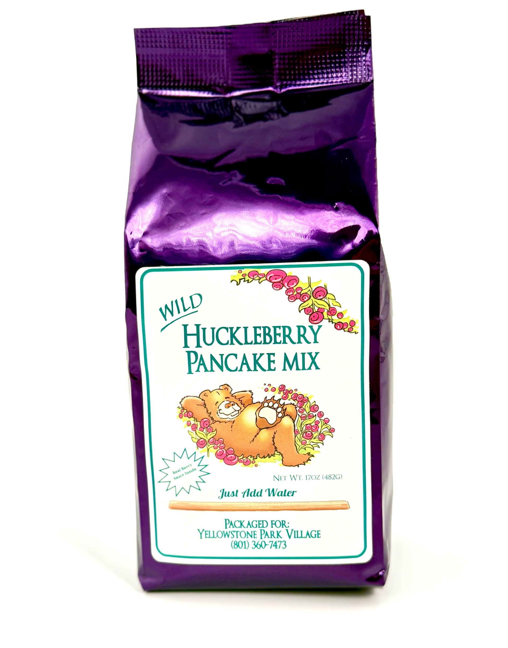 Bag of huckleberry pancake mix with jam jar inside