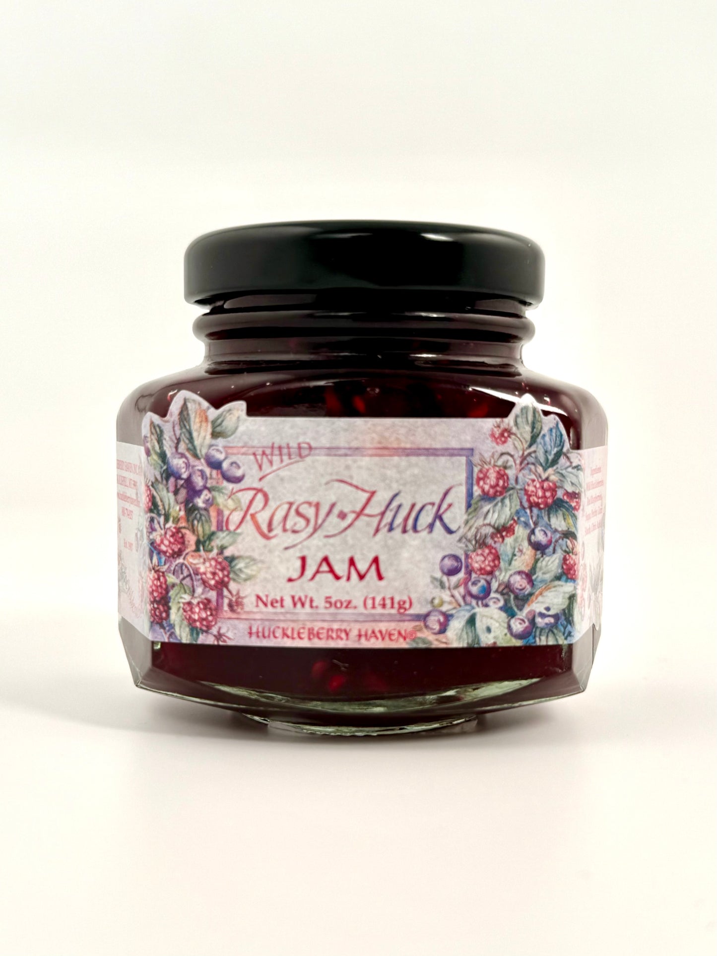 Jar of raspberry and huckleberry jam blend