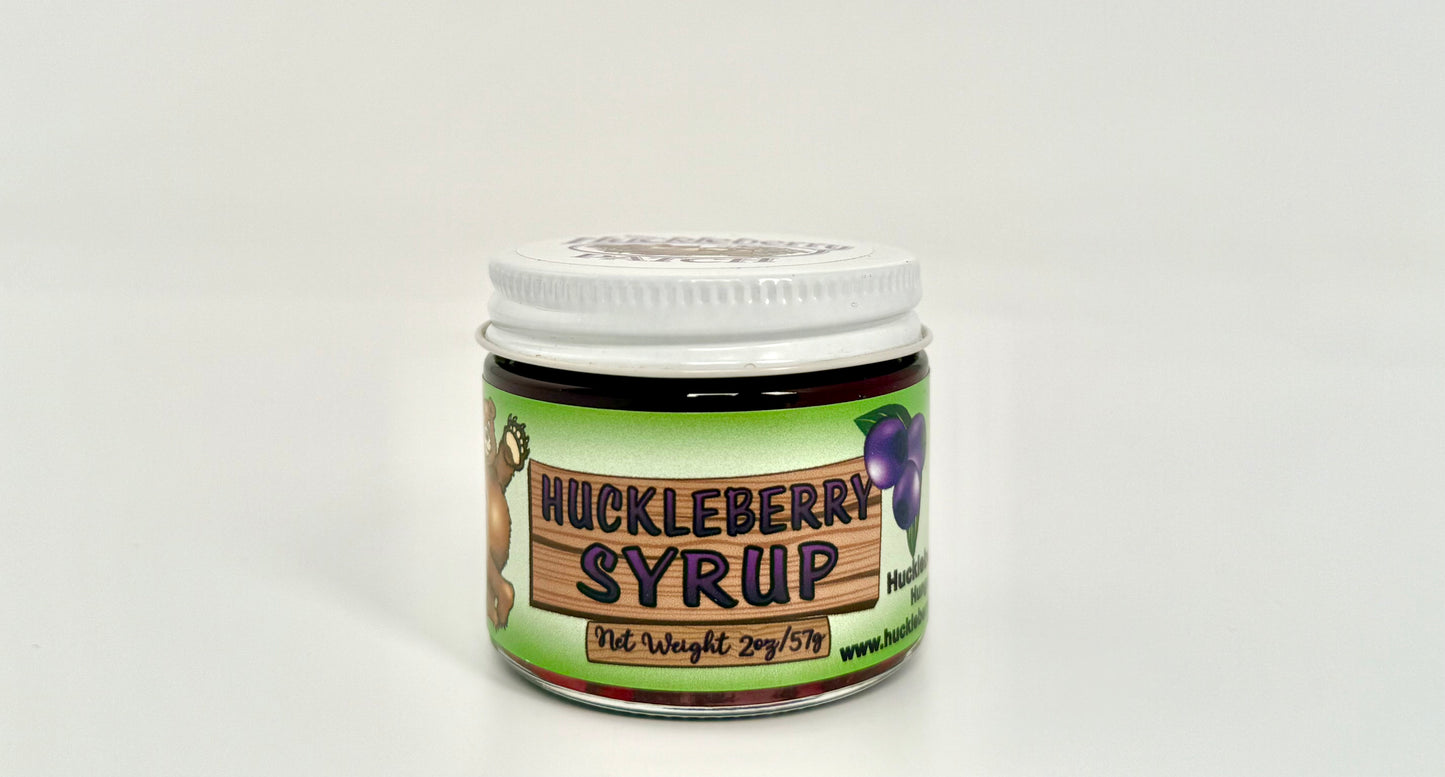 Sweet smooth purple syrup in small jar