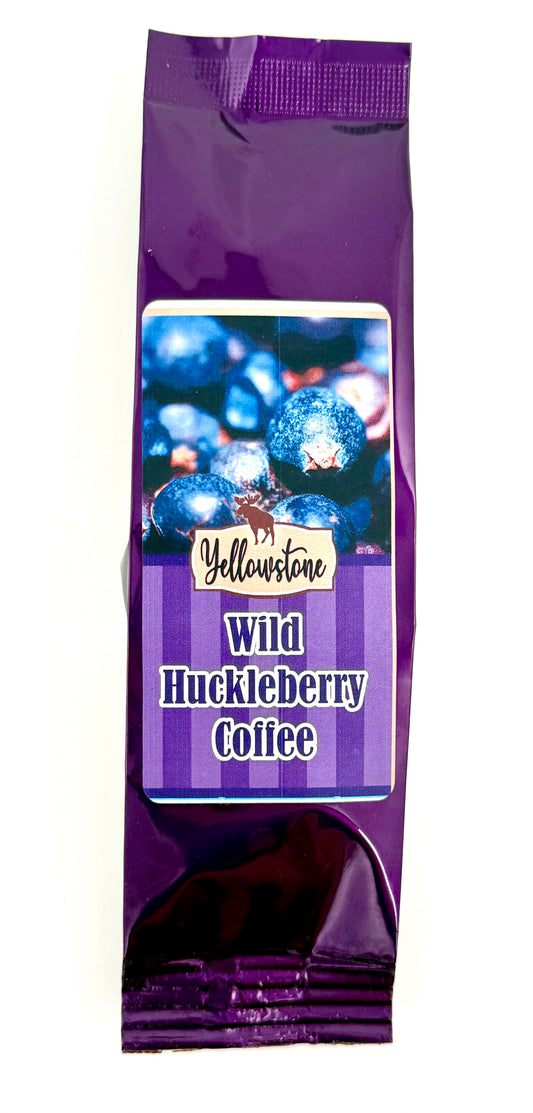 Bag of huckleberry-flavored ground coffee with purple label