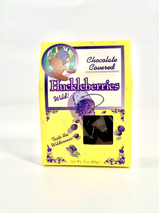 Chocolate-covered huckleberries in yellow box