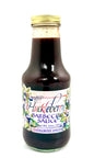 Bottle of huckleberry barbecue sauce with smoky berry flavor