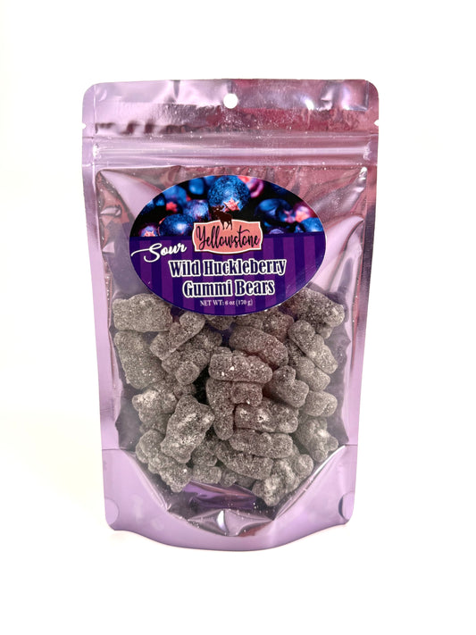 Sour huckleberry gummy bears in clear packaging with sugar coating