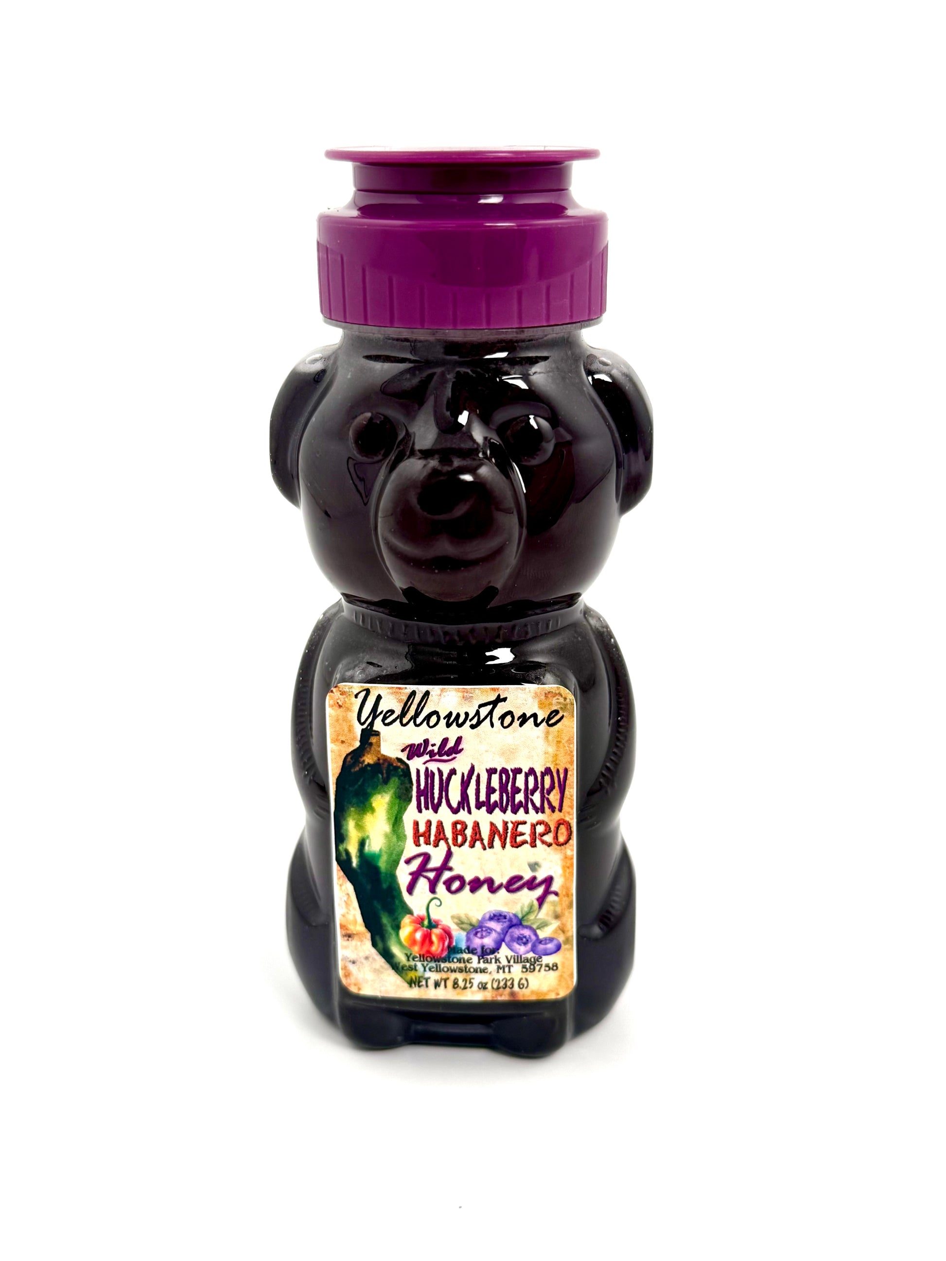 Sweet and spicy huckleberry habanero honey in bear bottle