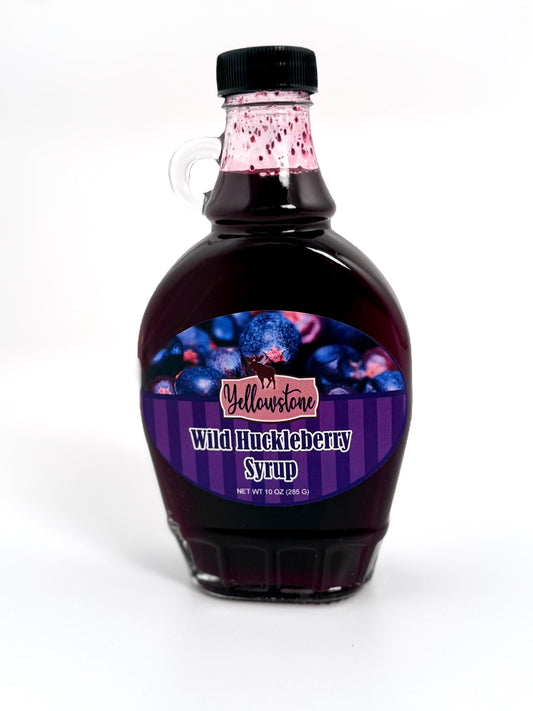 Classic huckleberry syrup in glass bottle with handle