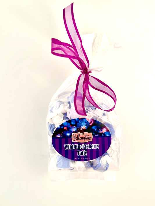Huckleberry taffy candies wrapped in wax paper Inside clear bag