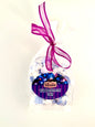 Huckleberry taffy candies wrapped in wax paper Inside clear bag