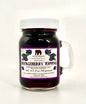 Small 4oz jar of huckleberry topping with front label visible