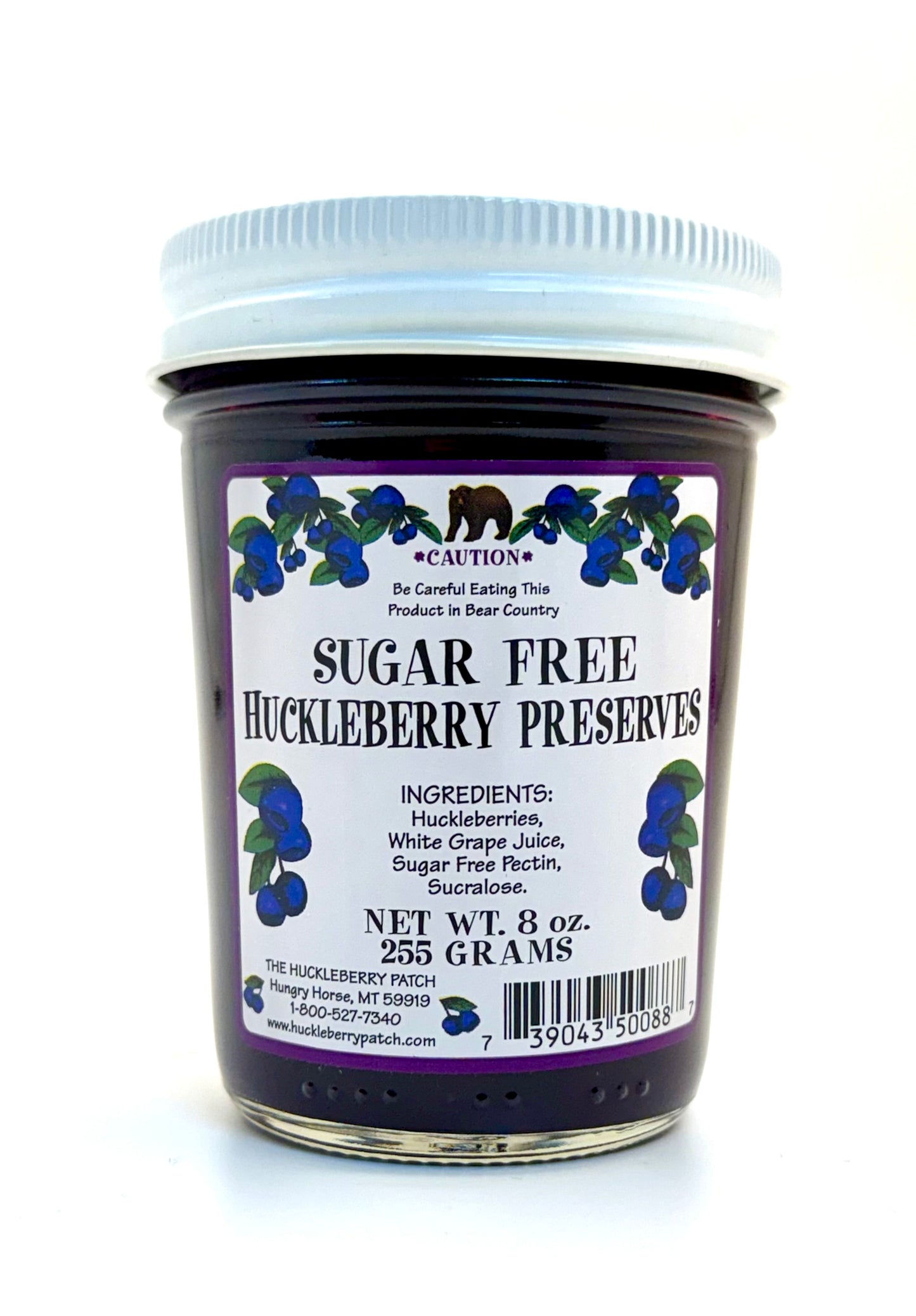 8oz jar of sugar free huckleberry preserves with white label